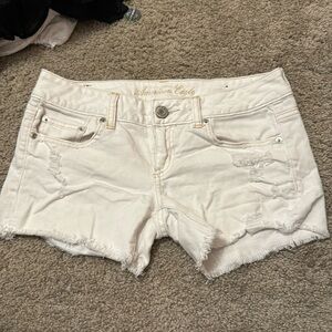 Low rise white jean shorts